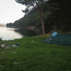 camping on the shore of Lake Dospat